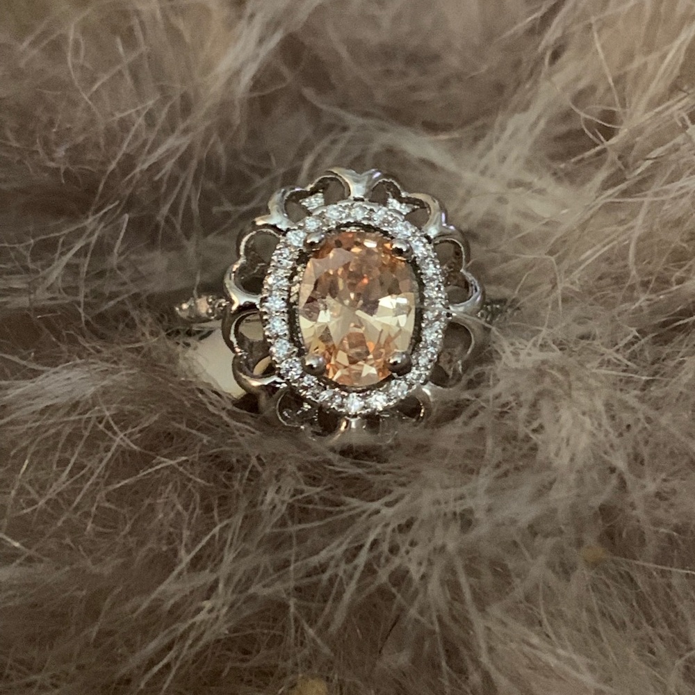 Champagne morganite ring with white topaz accents